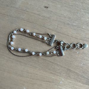 Layered gold and pearl bracelet